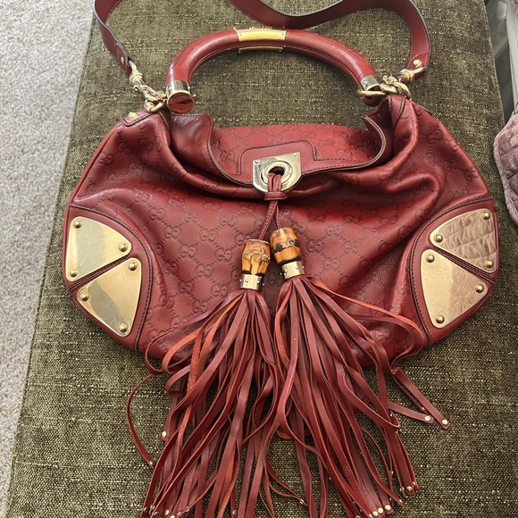 Gucci Handbags - Gucci Deep Red Indy Leather Shoulder Bag with Tassels